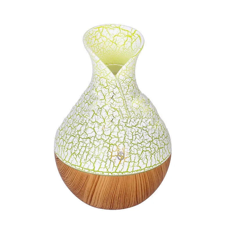 Small vase humidifier with 130ml water tank in Crackle Mahogany finish, USB powered, on a wooden desk