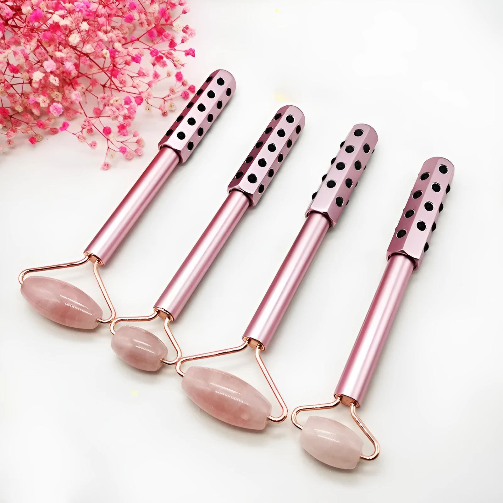 4-piece natural jade and germanium massager set including large face roller, small eye roller, and germanium-headed tools