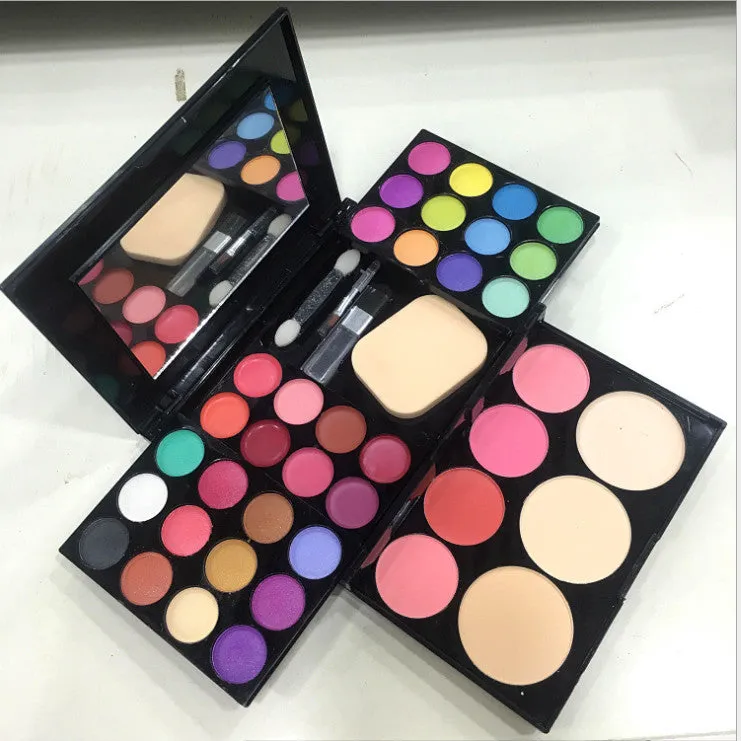 Three-layer makeup box set with 24 eyeshadow colours, 8 lipsticks, blushes, powder cakes, brushes, puff, and mirror