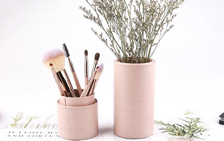 Daily makeup brush set with artificial fibre bristles and aluminium handles in black, brown, and pink