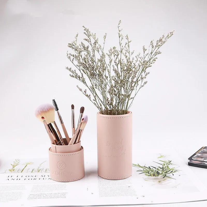 Daily makeup brush set with artificial fibre bristles and aluminium handles in black, brown, and pink