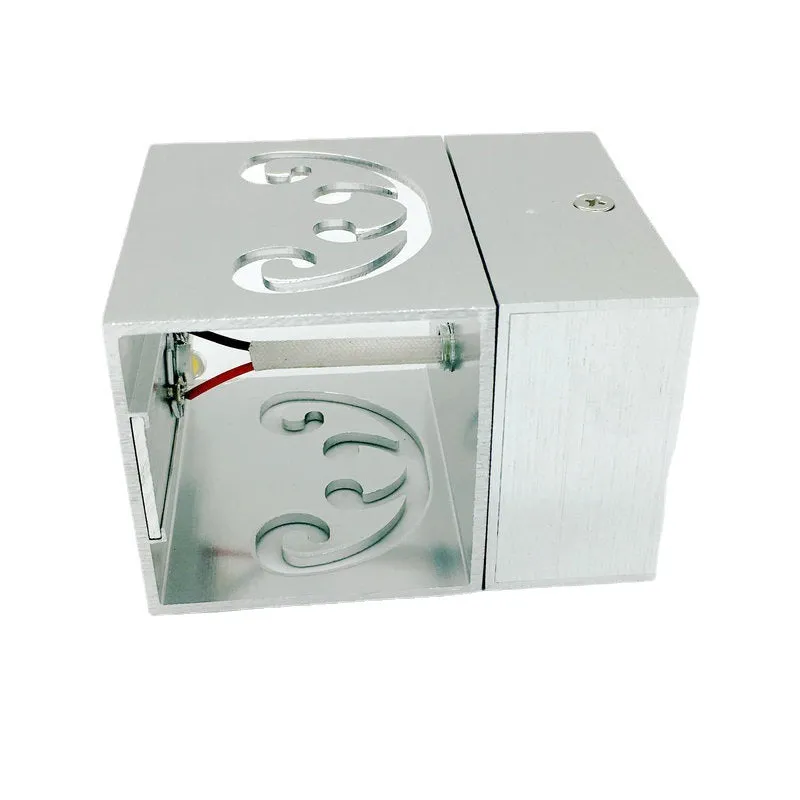 Modern aluminium butterfly-shaped LED wall lamp with remote control for seven colour options.
