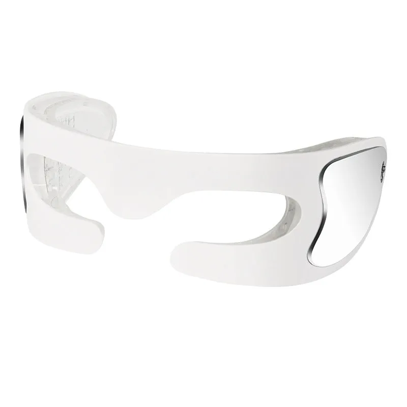 White portable rechargeable red light eye massager on a table