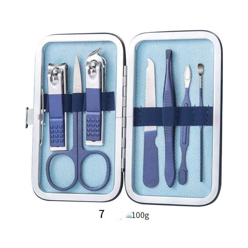 Professional stainless steel manicure and pedicure tool set in black leather case with nail clippers, cuticle pliers, and cuticle knife