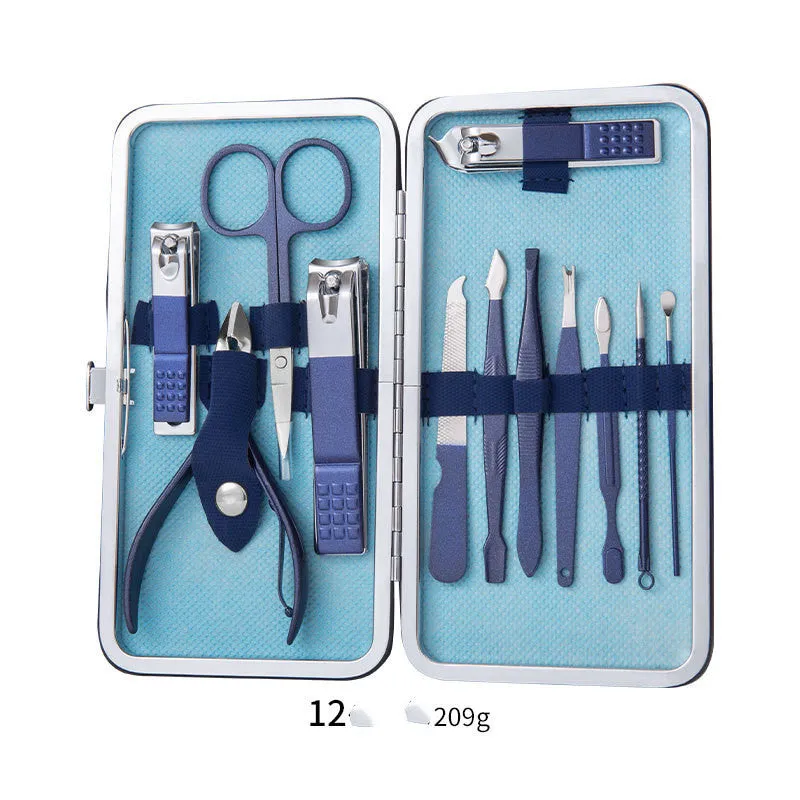 Professional stainless steel manicure and pedicure tool set in black leather case with nail clippers, cuticle pliers, and cuticle knife