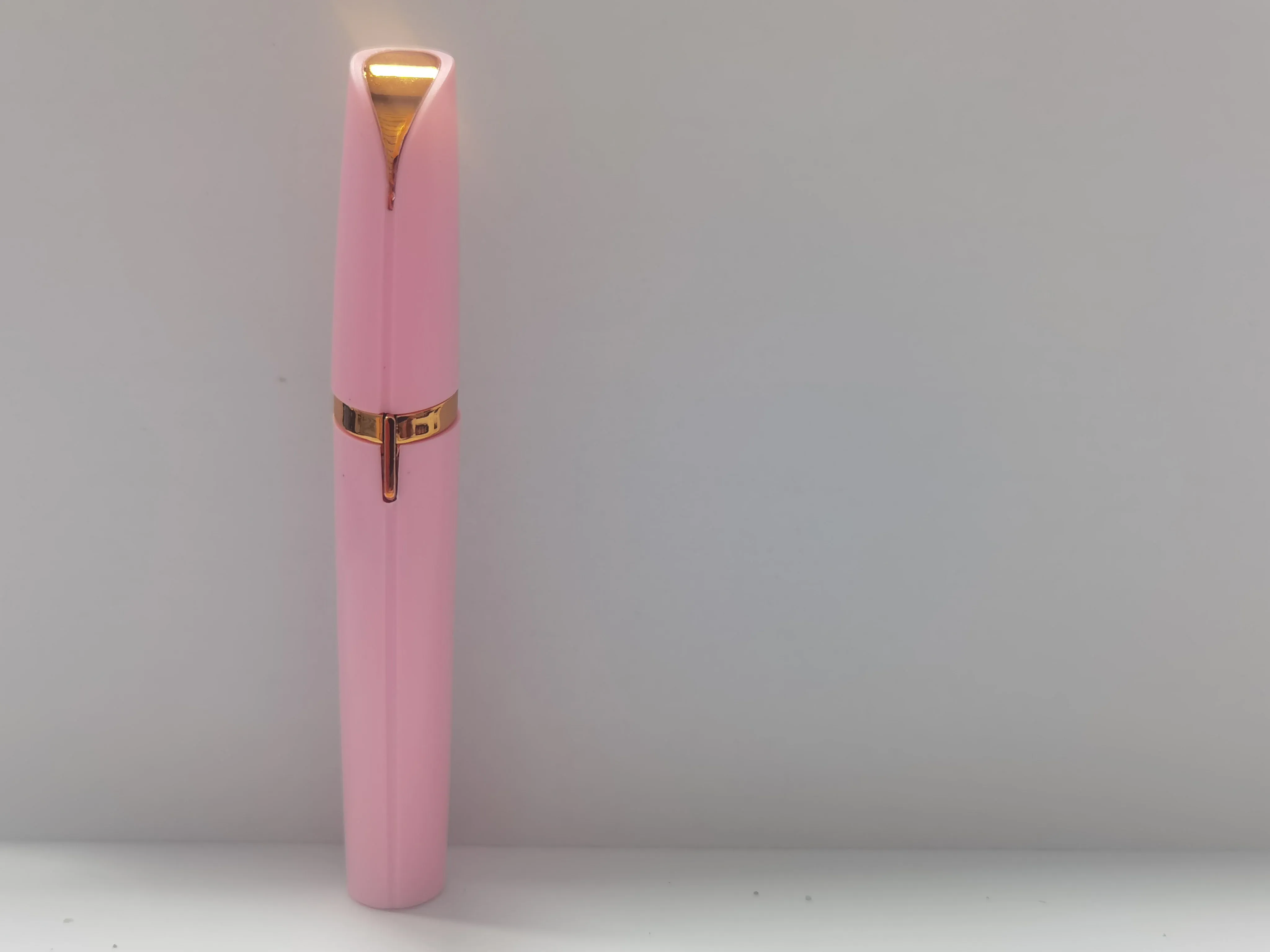 Mini electric eyebrow trimmer lipstick style with LED light and gold plated head for painless hair removal