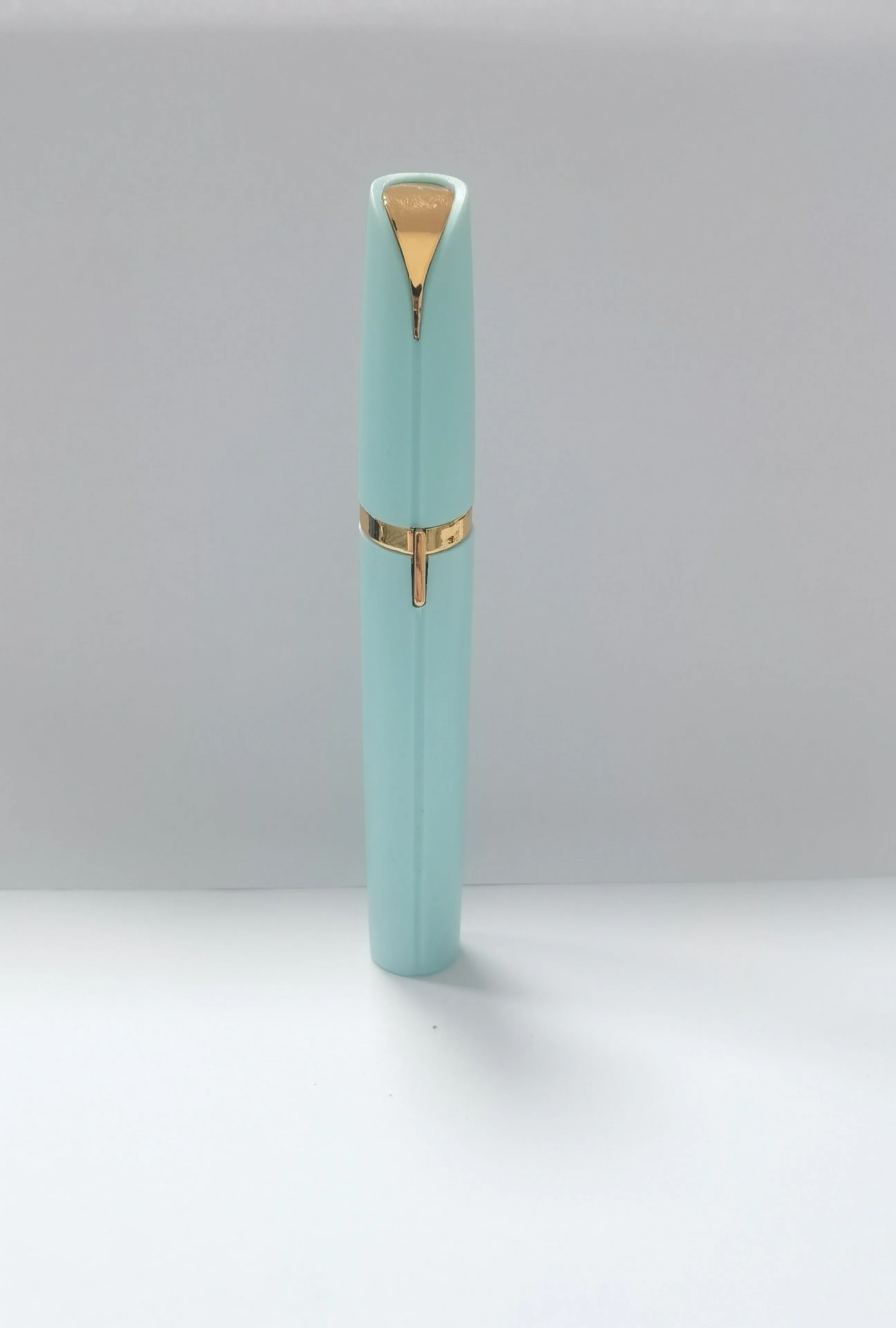 Mini electric eyebrow trimmer lipstick style with LED light and gold plated head for painless hair removal