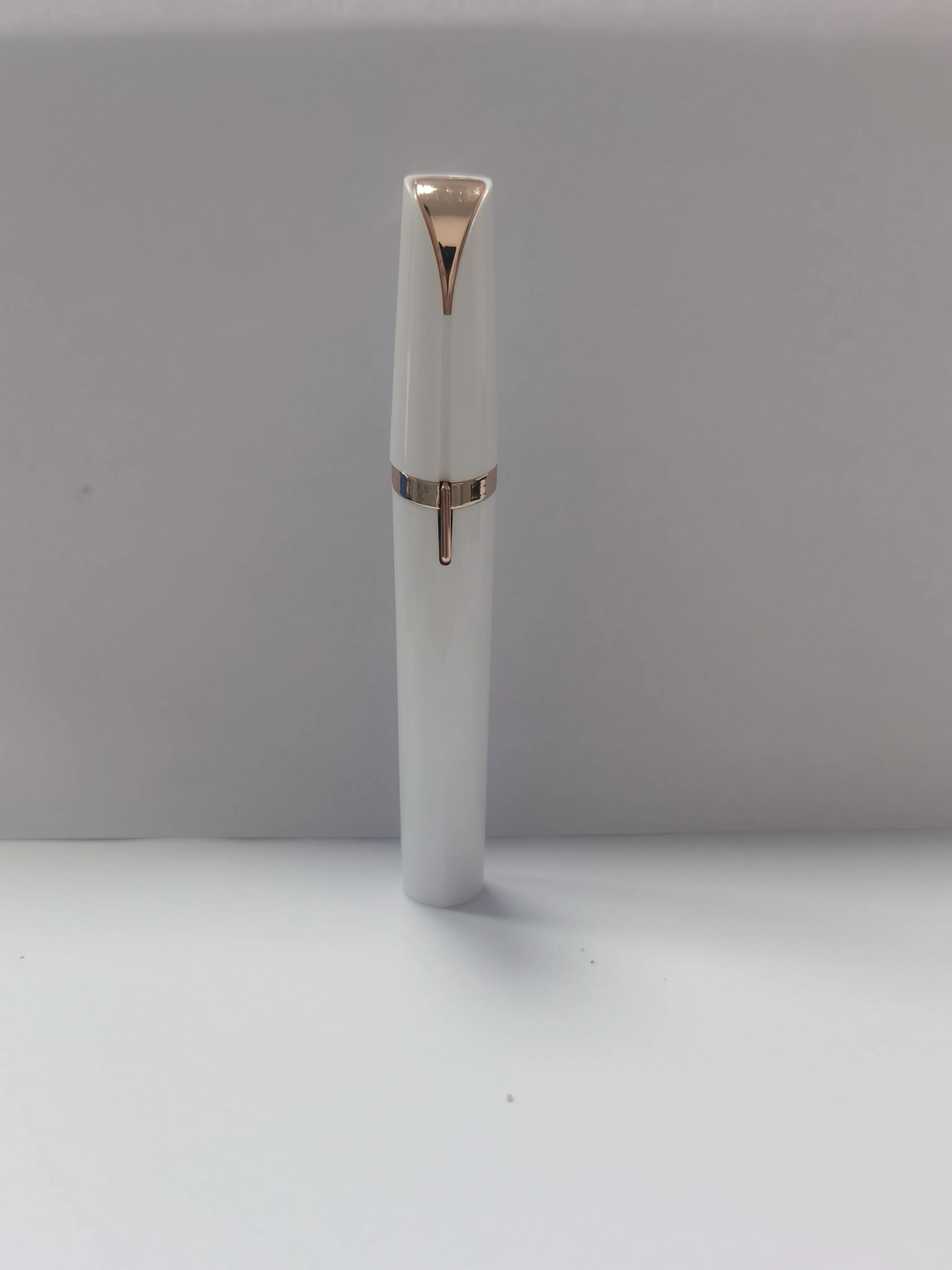 Mini electric eyebrow trimmer lipstick style with LED light and gold plated head for painless hair removal