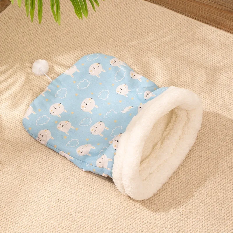 A soft flannel cat sleeping bag nest bed measuring 50 by 40 cm.