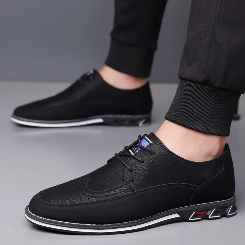 Men's low-top casual leather shoes with a leather toe cap and sewing line detail on fabric upper.