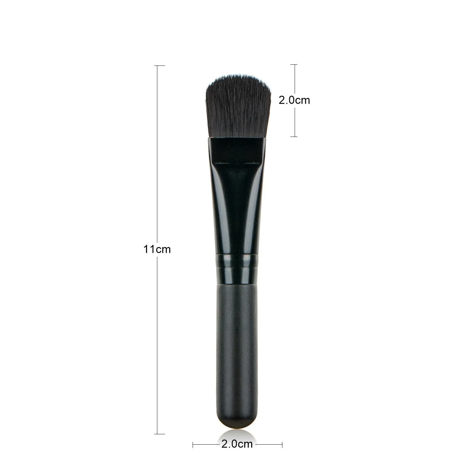 Wooden handle portable facial treatment brush with artificial fibre bristles on white background