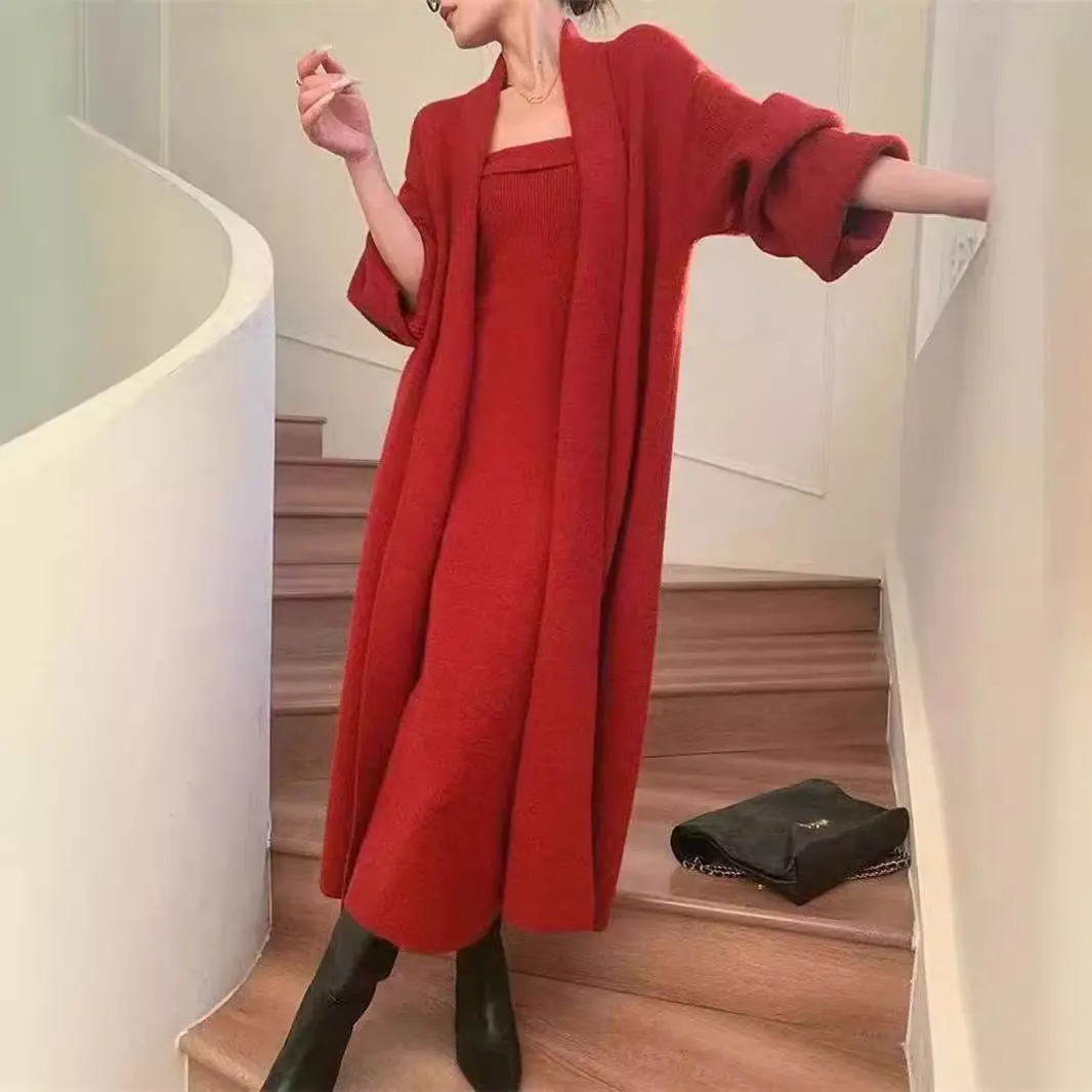 Women's grey knitted long-sleeve dress and matching cardigan set laid flat.