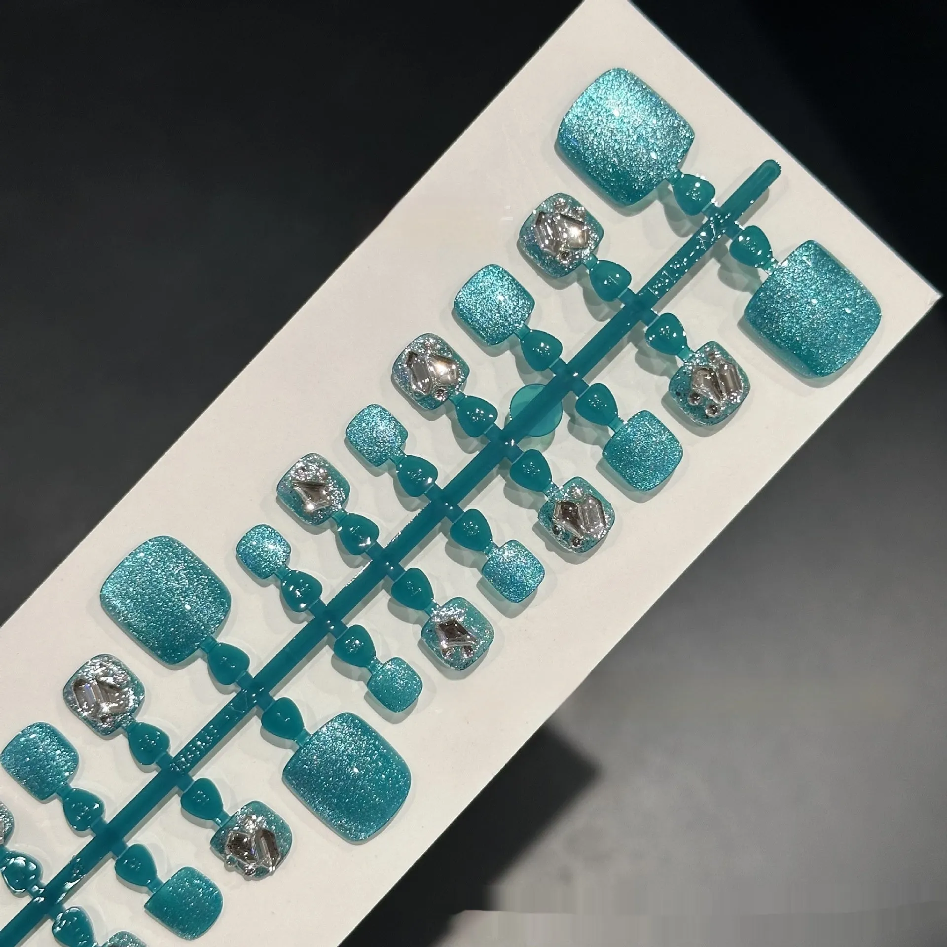 Blue diamond finish toenail wear armour set with cat's eye style and 42 pieces