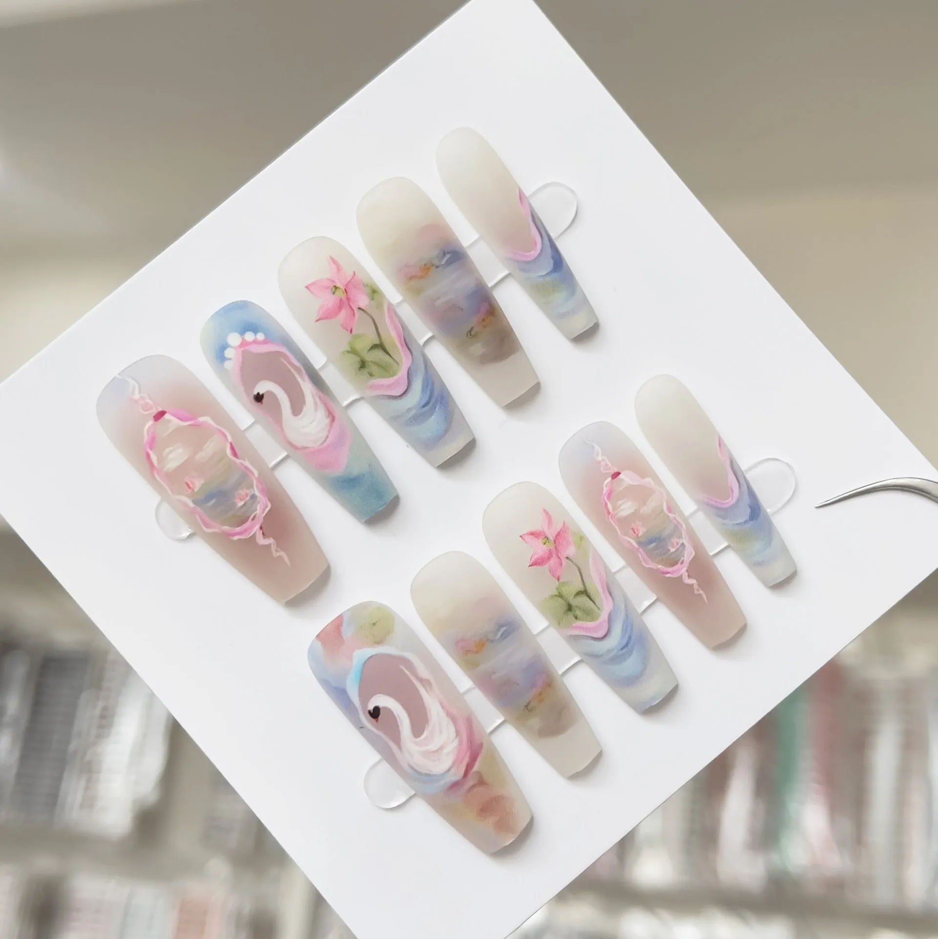 Retro Swan Lake artificial nail tips set in long ladder shape with three finish options: matte, glossy, suede frosted