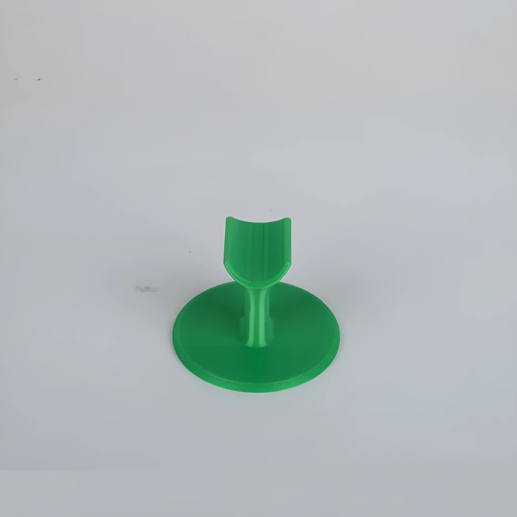 Chinese style resin nail bracket 6x6x4.3 cm on a desk holding nails