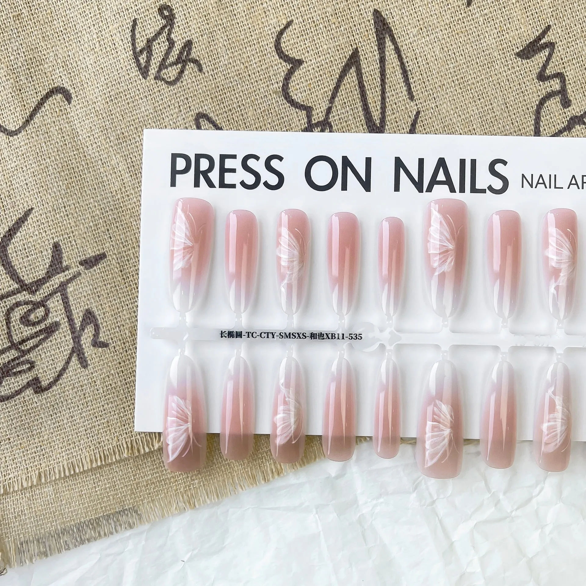 Chinese style butterfly oval almond press-on nails 40pcs matte and glossy finish options on display
