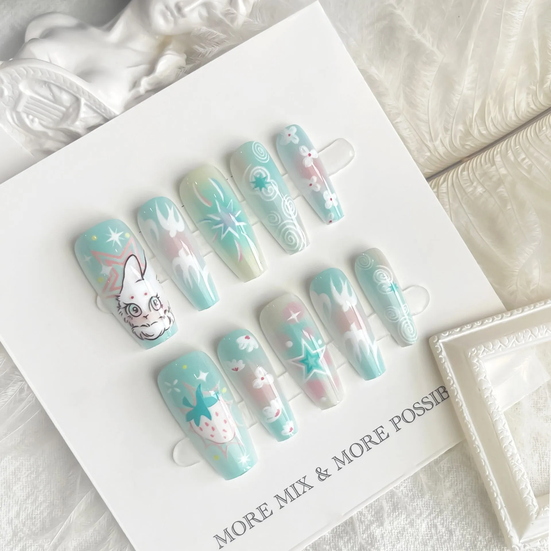 Cartoon cute rabbit middle ladder fake nails with cat's paw pattern in Rabbit Planet colour, including 40 pieces with frosted and glossy finish options