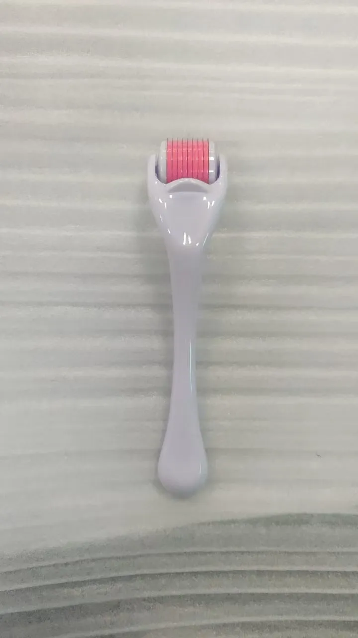 Micro needle derma roller with 540 needles in PC material showing handle and wheel colour options