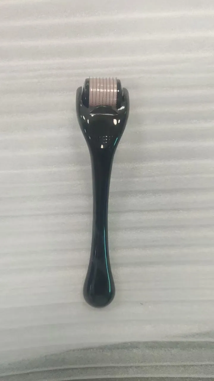 Micro needle derma roller with 540 needles in PC material showing handle and wheel colour options