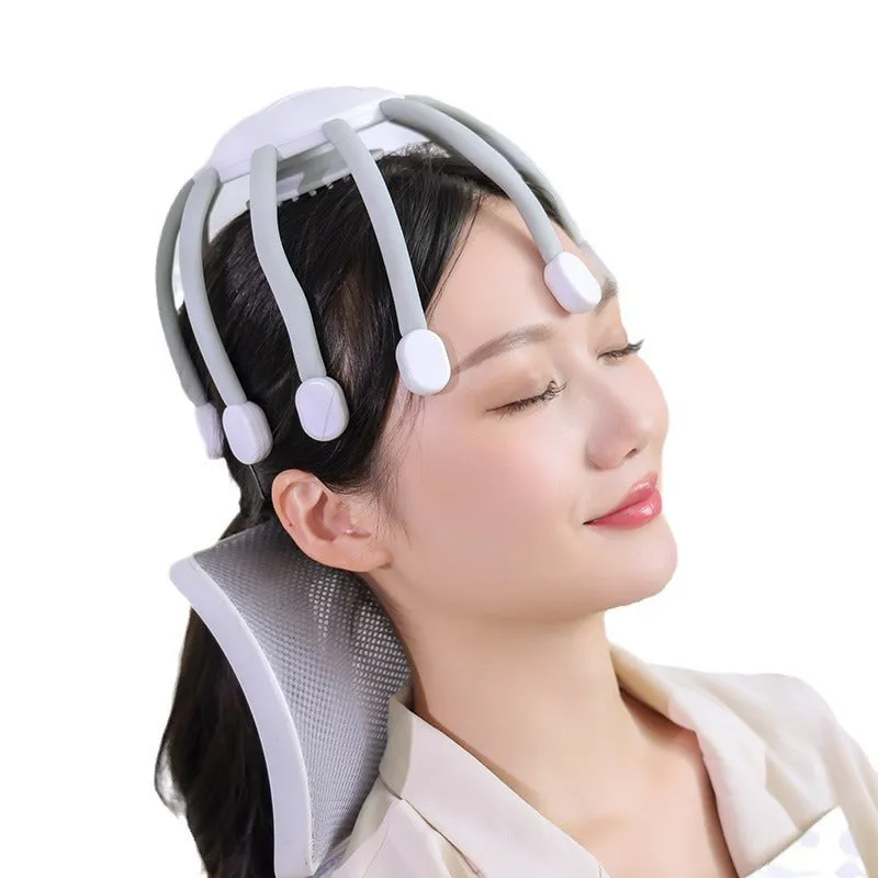 Black and white head massagers with multiple vibrating claws on a stand.