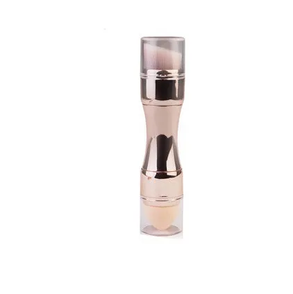 Four-in-one retractable makeup brush with gold handle and four brush heads on a white background