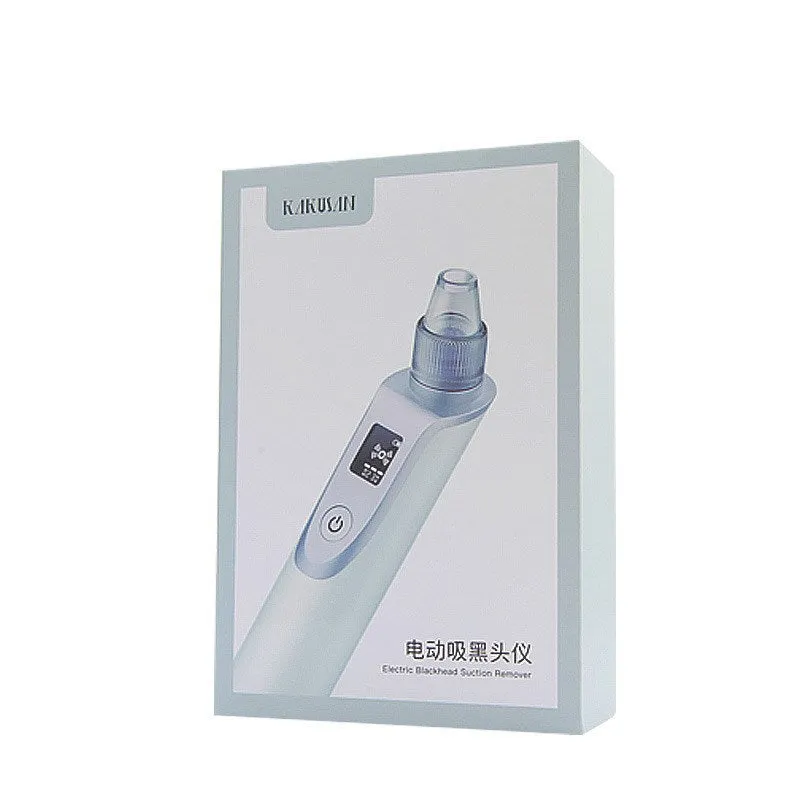 White handheld ultrasonic facial cleansing instrument with interchangeable suction heads on a clean surface.