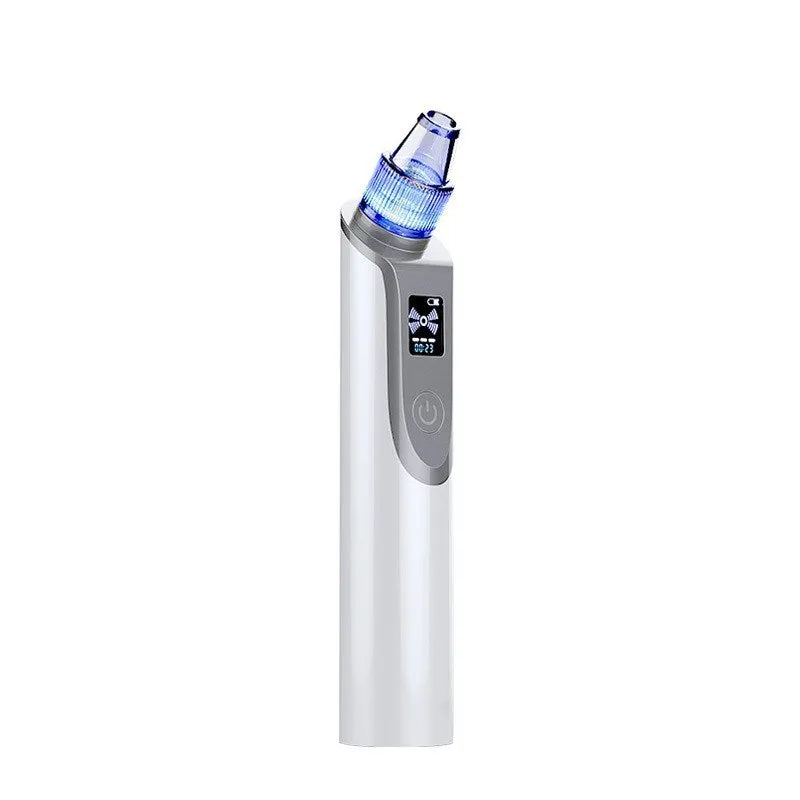 White handheld ultrasonic facial cleansing instrument with interchangeable suction heads on a clean surface.