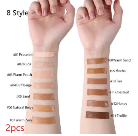 Liquid foundation oil control concealer in a squeeze tube with colour swatches showing 13 shade options