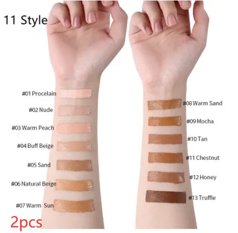 Liquid foundation oil control concealer in a squeeze tube with colour swatches showing 13 shade options