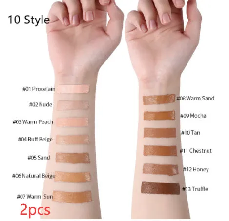 Liquid foundation oil control concealer in a squeeze tube with colour swatches showing 13 shade options