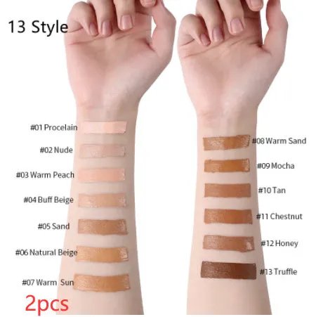 Liquid foundation oil control concealer in a squeeze tube with colour swatches showing 13 shade options