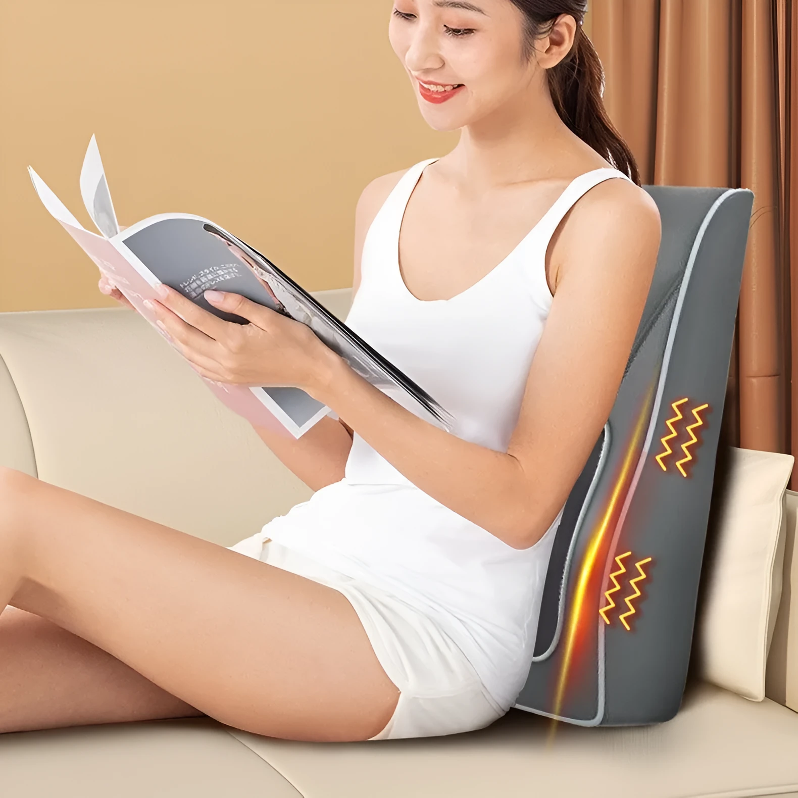 Heating electric magnetic therapy vibration massage pillow Deluxe Silver Grey edition with remote control on a chair