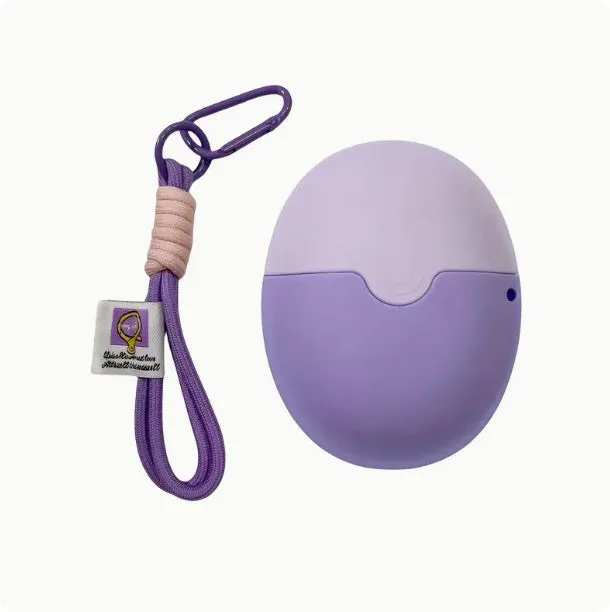 Removable silicone roller ball cream applicator in blue with lanyard, 111x86x50mm, for face and body skincare