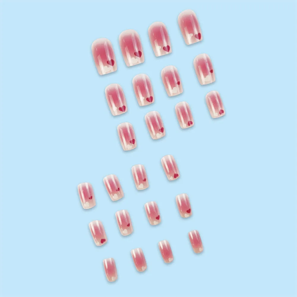 Red and white love gradient nail stickers with starry sky pattern and glue tube