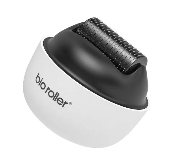 Men's G4 white portable beard derma roller with six microneedle length options on a clean surface