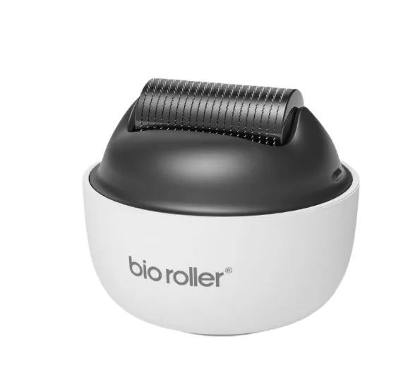 Men's G4 white portable beard derma roller with six microneedle length options on a clean surface