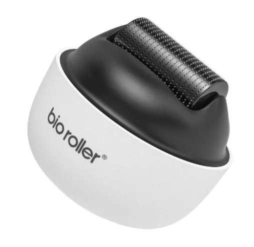 Men's G4 white portable beard derma roller with six microneedle length options on a clean surface