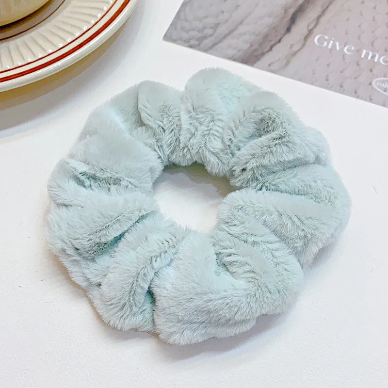 Solid colour cloth hair ring in round ring style with loose fit, available in multiple colours