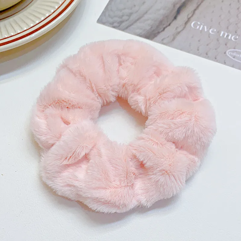 Solid colour cloth hair ring in round ring style with loose fit, available in multiple colours