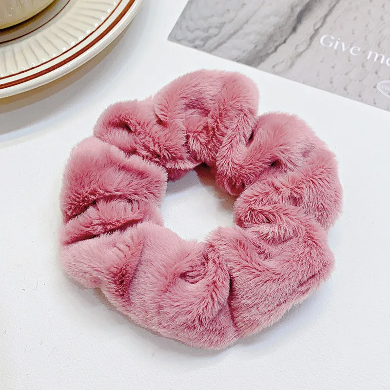 Solid colour cloth hair ring in round ring style with loose fit, available in multiple colours