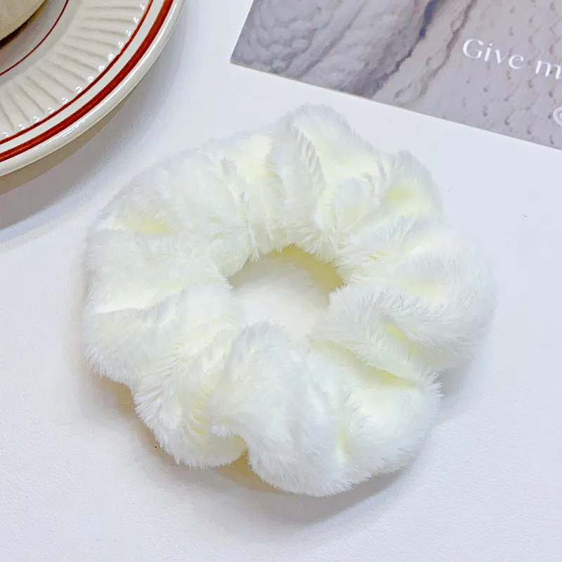 Solid colour cloth hair ring in round ring style with loose fit, available in multiple colours