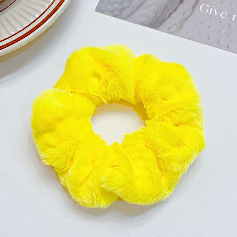 Solid colour cloth hair ring in round ring style with loose fit, available in multiple colours