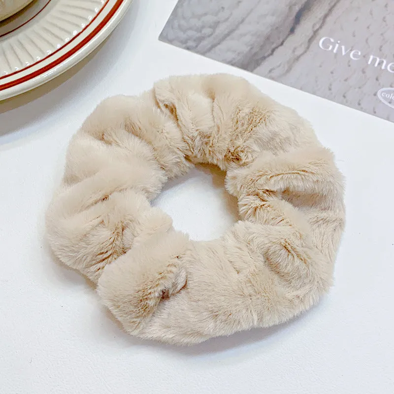 Solid colour cloth hair ring in round ring style with loose fit, available in multiple colours
