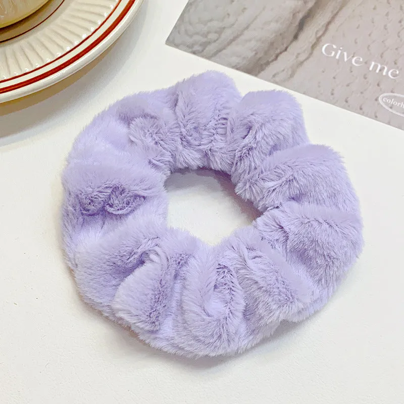 Solid colour cloth hair ring in round ring style with loose fit, available in multiple colours