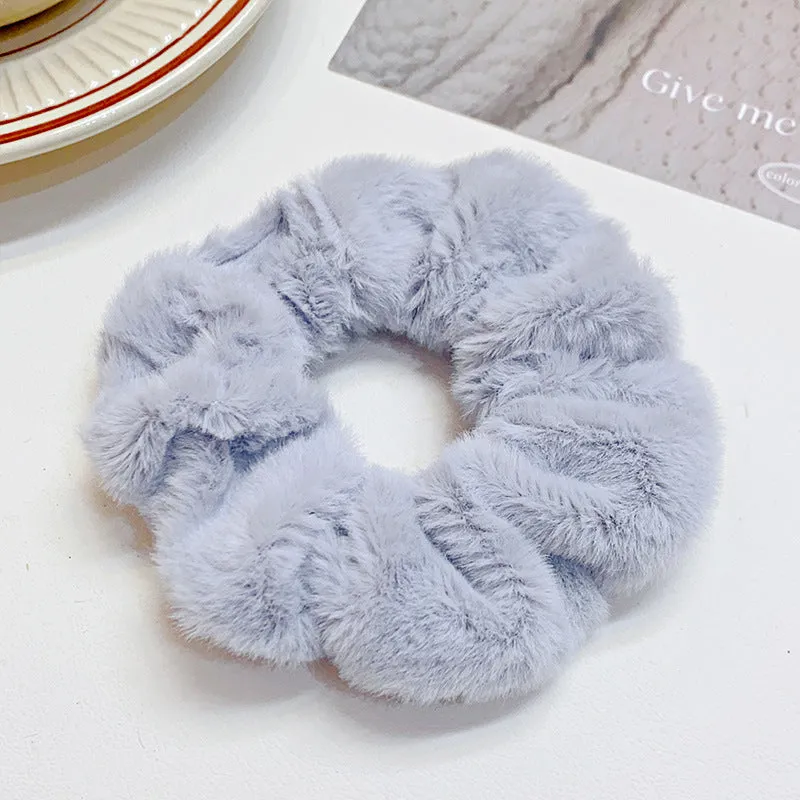 Solid colour cloth hair ring in round ring style with loose fit, available in multiple colours