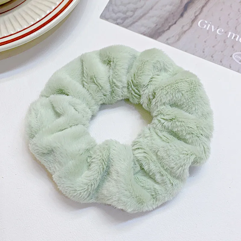 Solid colour cloth hair ring in round ring style with loose fit, available in multiple colours