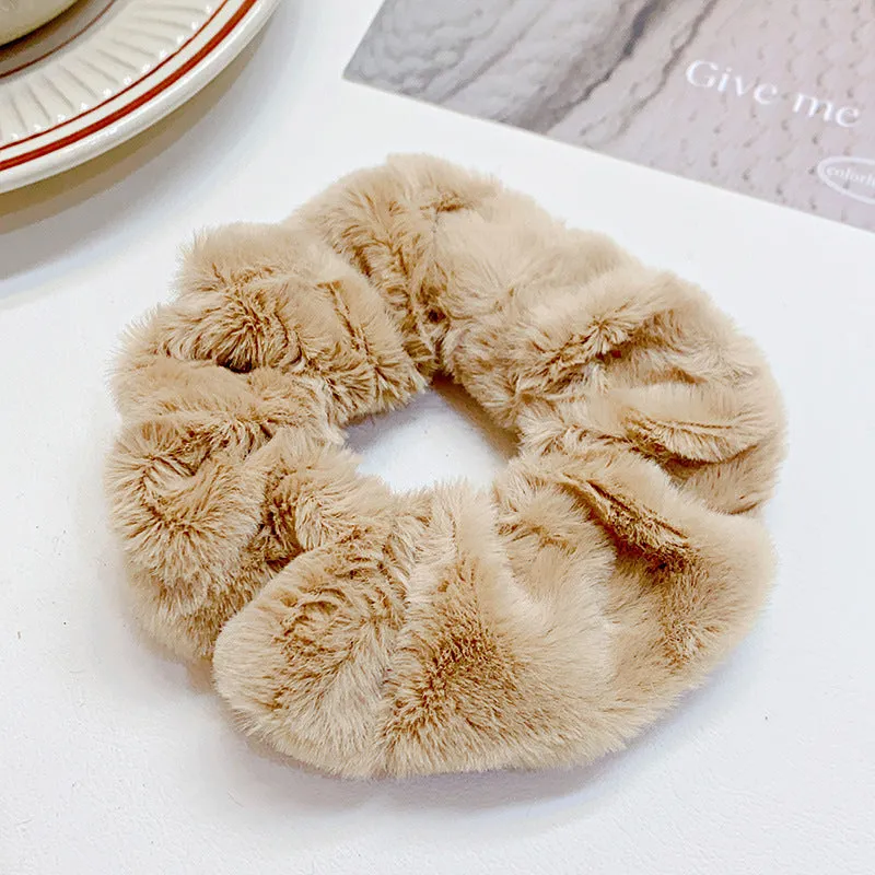 Solid colour cloth hair ring in round ring style with loose fit, available in multiple colours