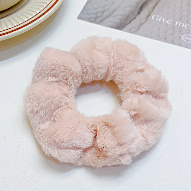 Solid colour cloth hair ring in round ring style with loose fit, available in multiple colours