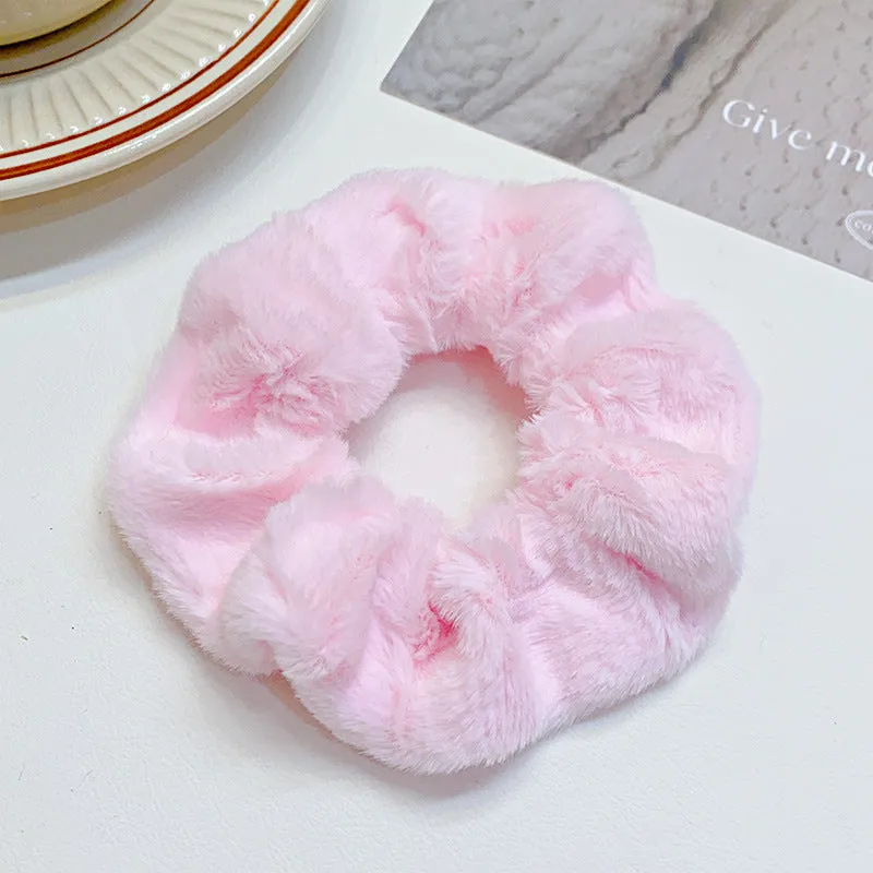 Solid colour cloth hair ring in round ring style with loose fit, available in multiple colours