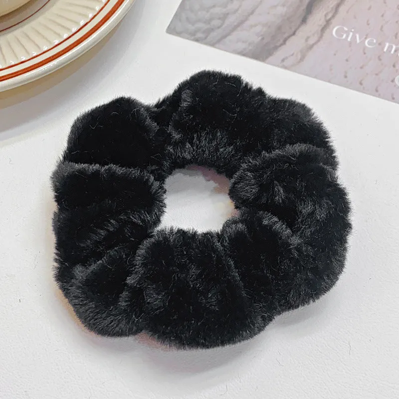 Solid colour cloth hair ring in round ring style with loose fit, available in multiple colours